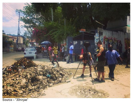 VR Means MIB – Lewis Smithingham has a standing rule for his crew, always wear black and stay out of the way when the VR rig is rolling. Above, they’re preparing a shot for their documentary on Haiti.